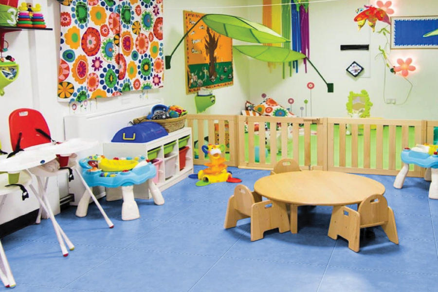 Bright playroom with a colourful Balena Happy Series floor