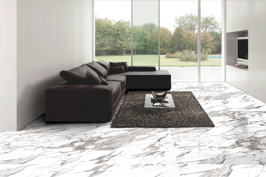 Contemporary living room with a veined Balena Velvet marble-look floor