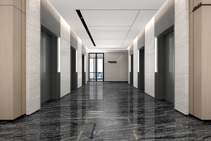 Commercial corridor finished in dark Balena X-Stone Granite Plus flooring